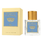 Acqua di Bolgheri Luce Eau de Parfum – glasflaska med guldlock bredvid beige presentförpackning