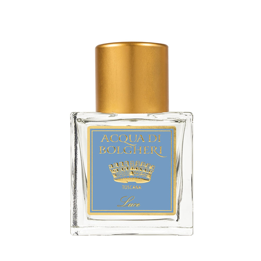 Acqua di Bolgheri Luce parfymflaska i klarglas med guldlock och etikett – Eau de Parfum närbild